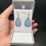 Brincos em prata e pedra opala